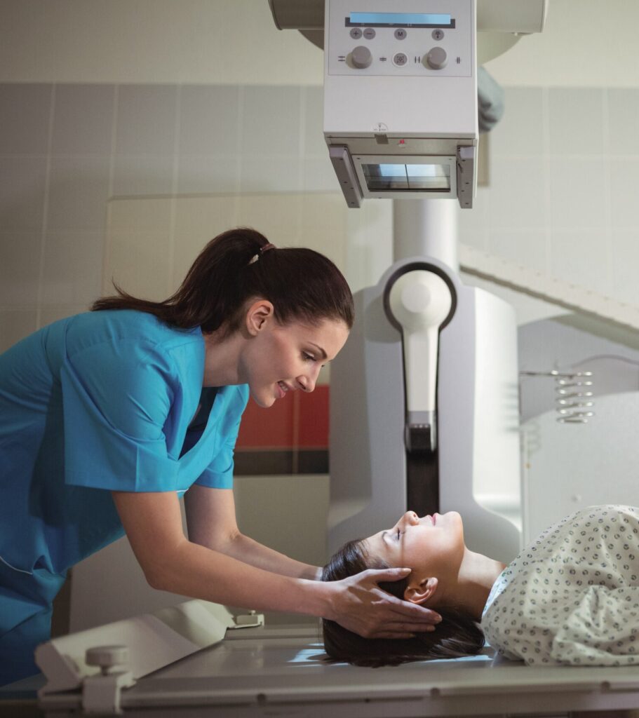 Female Radiology Nurse with Patient